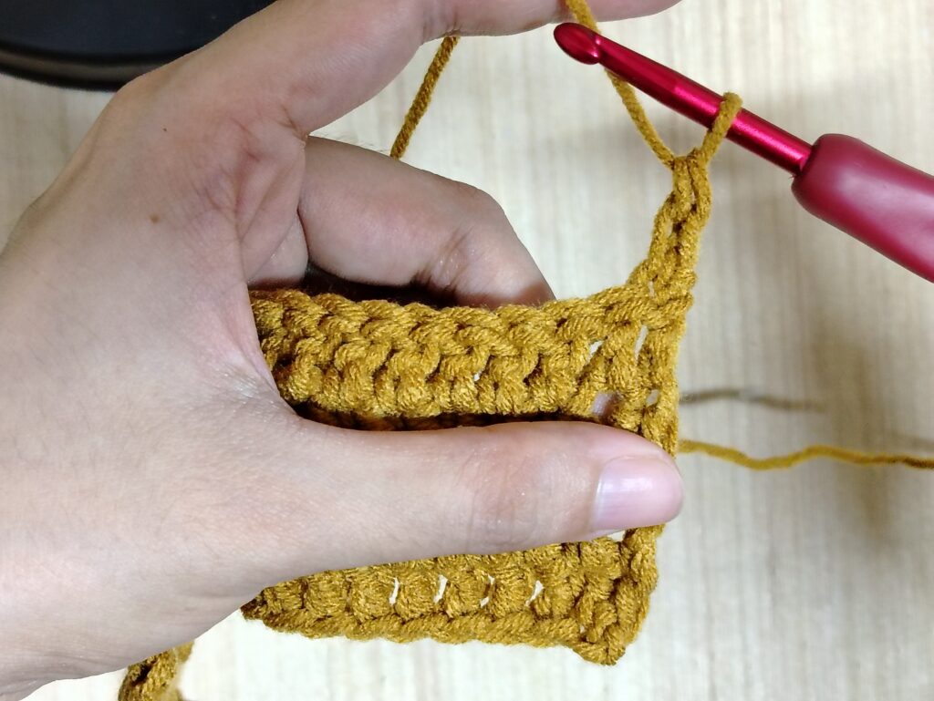Double crochet panel with straight edges created using the stacked single crochet technique.