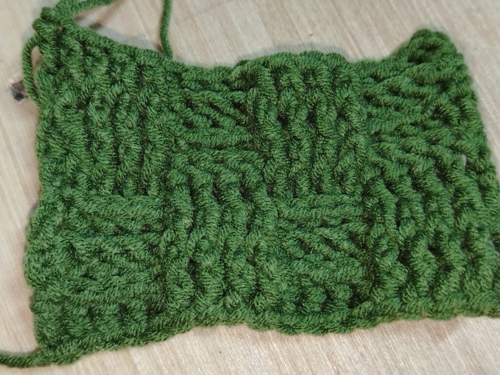 Crochet basket weave stitch swatch showing a thick woven texture created with front and back post stitches