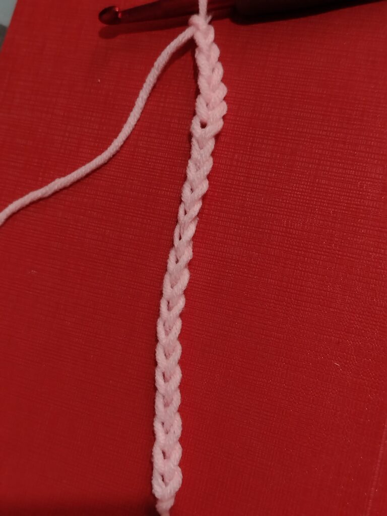 foundation chain for star stitch using pink acrylic yarn